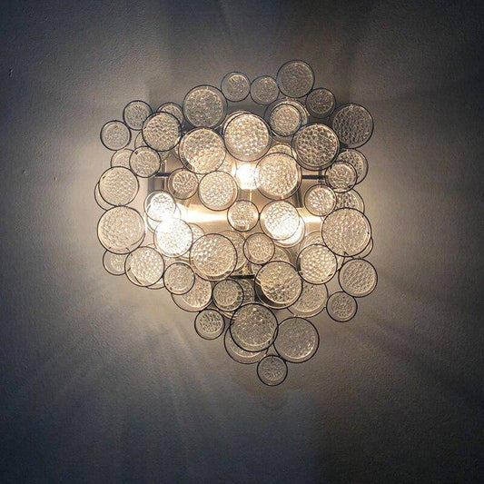 Lampada da parete a LED di design con diversi cerchi in vetro cristallo