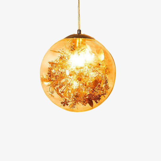 Lampadario di design a LED con sfera in vetro e foglie cromate all'interno